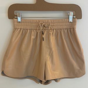 Alice and Olivia vegan leather elastic shorts.